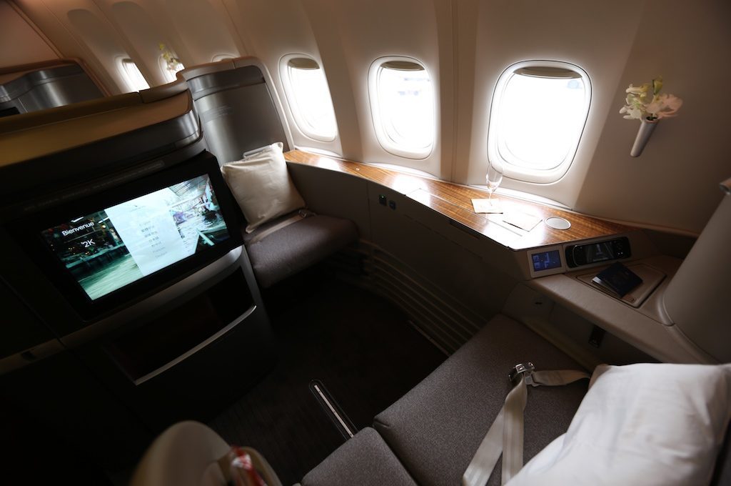 Cathay Pacific first class seat with  three windows
