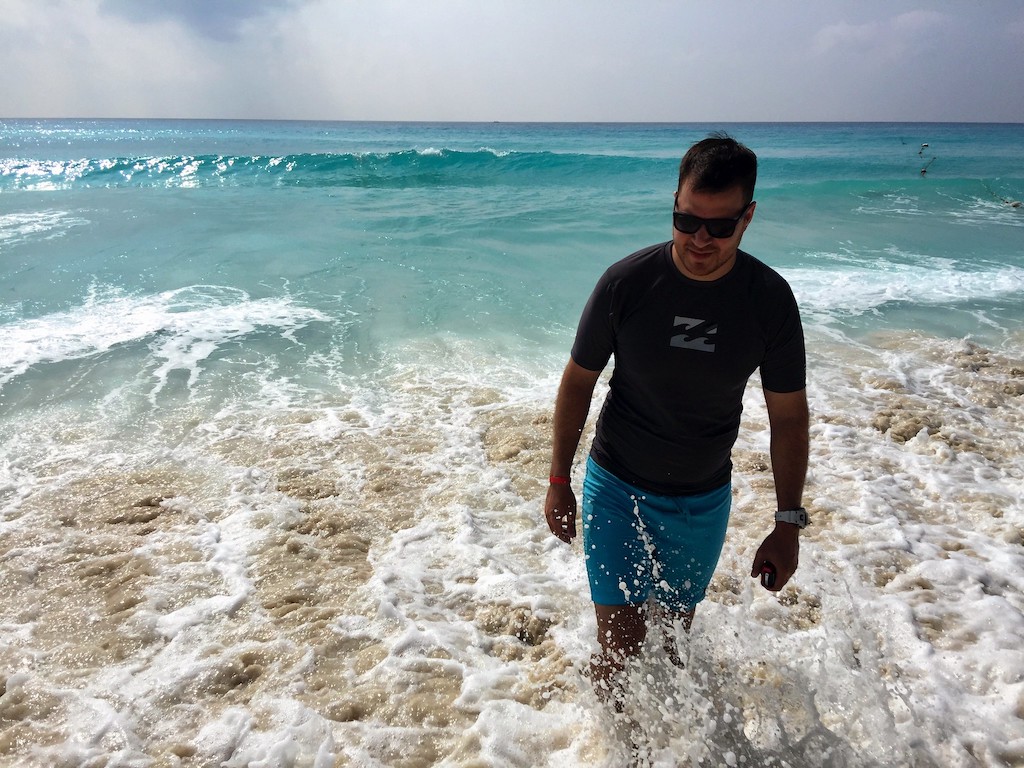 Man in water on beach