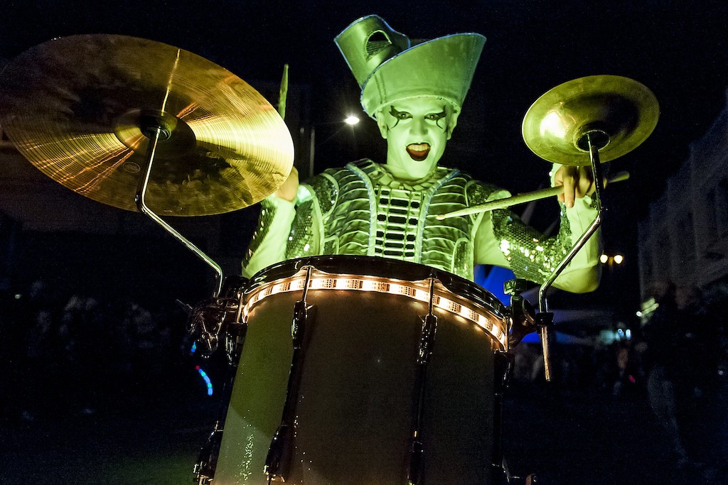 Drummer in green