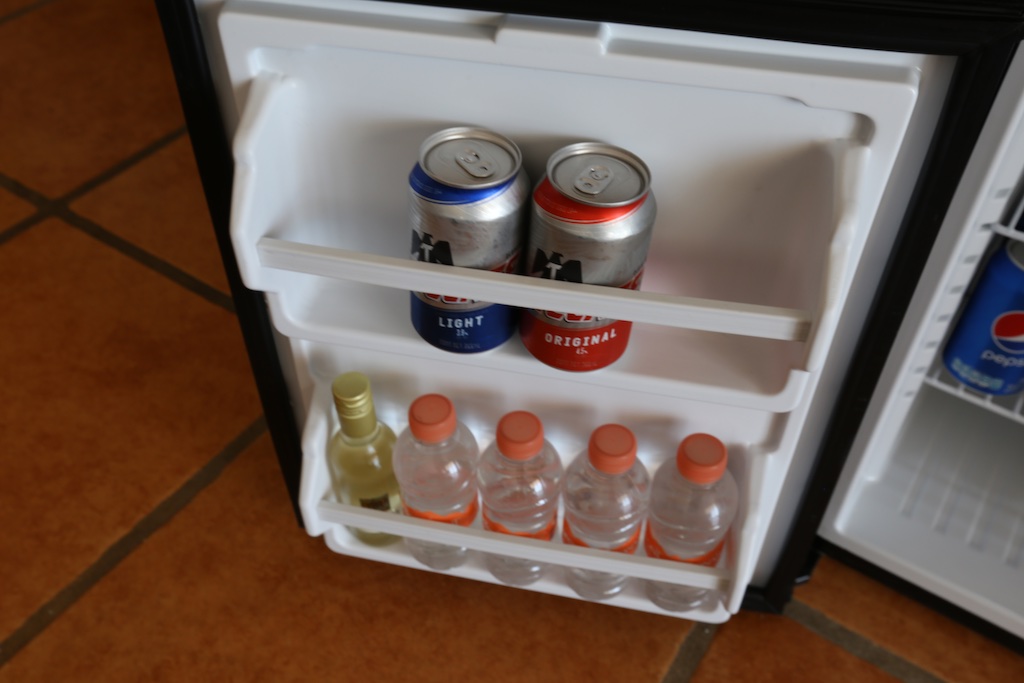 Picture of a mini fridge with beverages