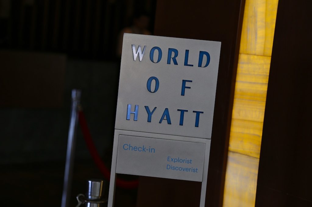 hotel check-in sign for Hyatt elite members
