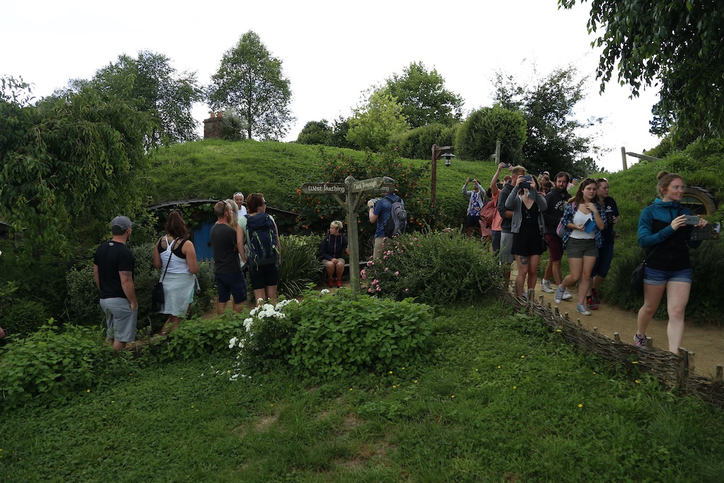 Group at hobbit hole Hobbiton Movie Set Tour