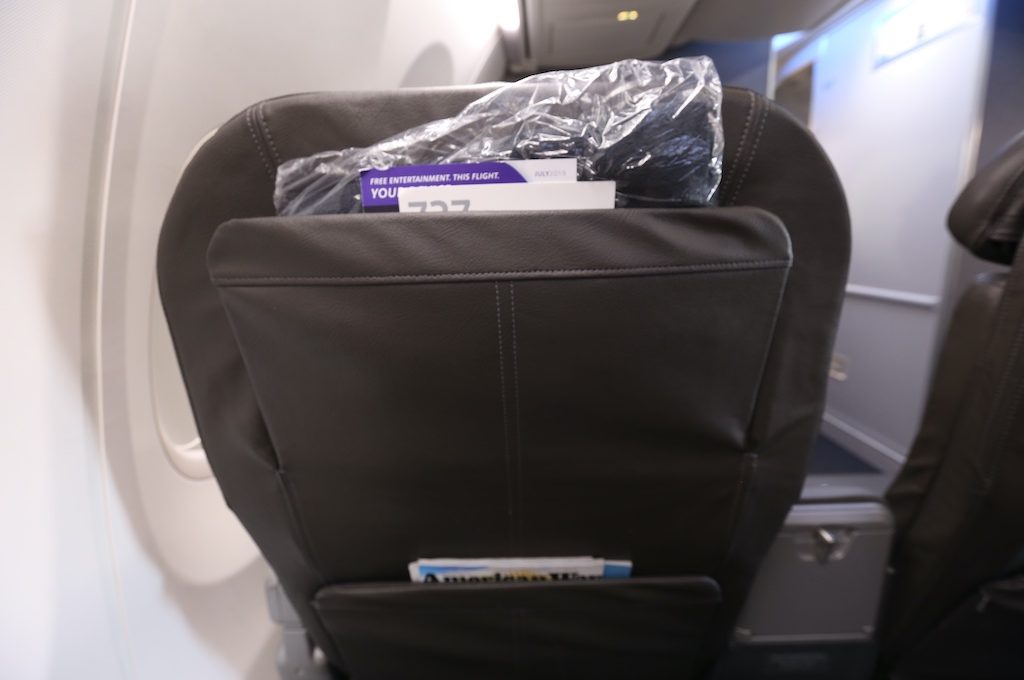 Back of American Airlines first class seat.