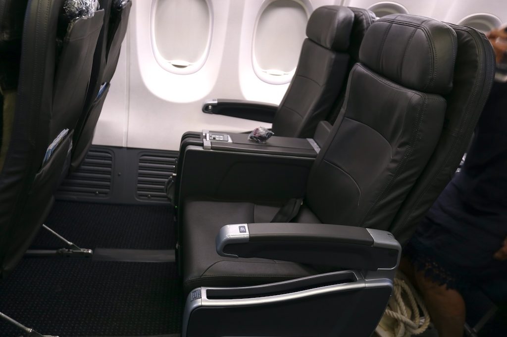 American Airlines first class seat showing legroom.