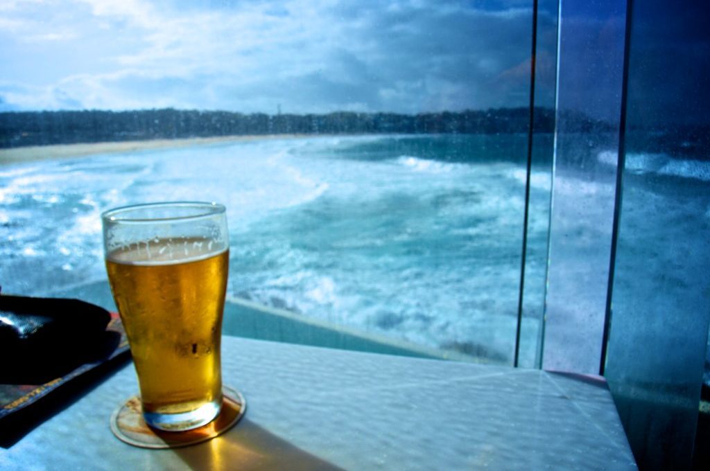 Beer at Icebergs bar with view of ocean