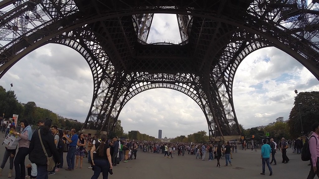 Crowd Under Eiffel Tower