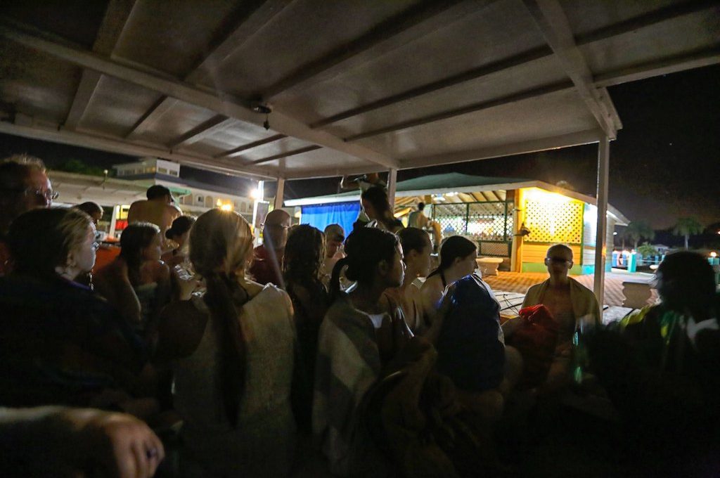 Crowded boat at night