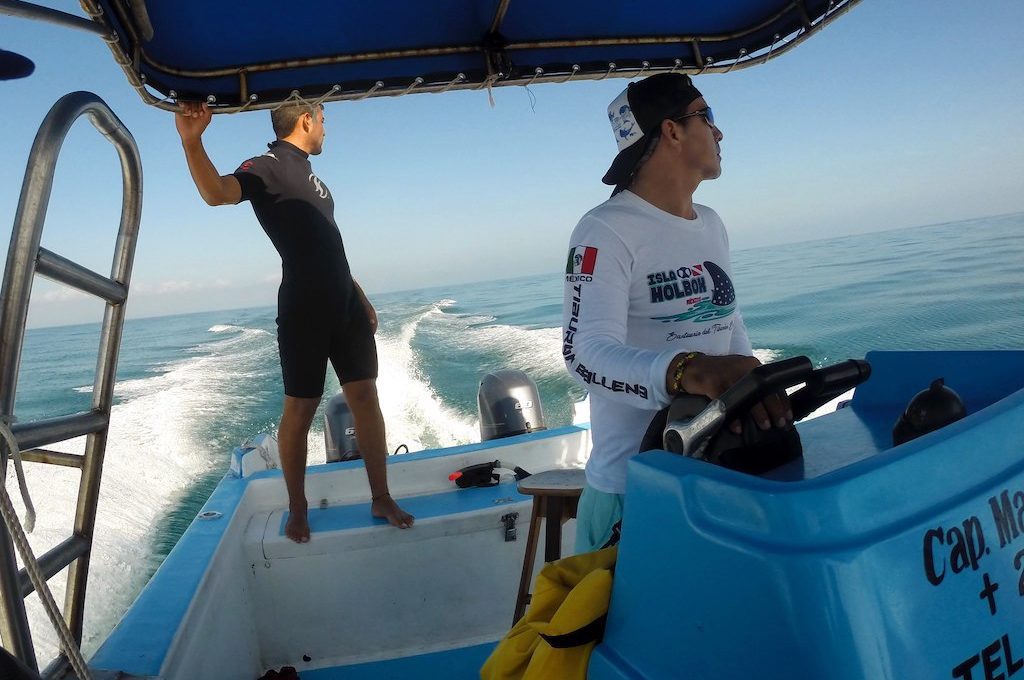 Men in moving boat