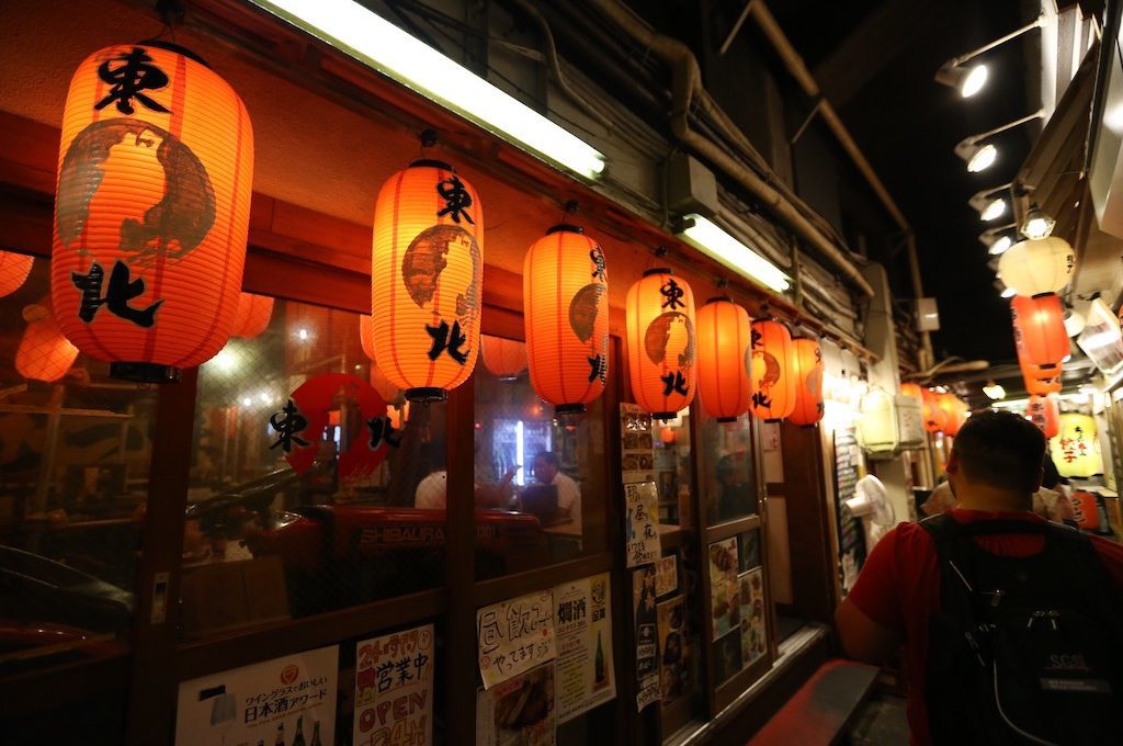 Restaurant lined alleyway Tokyo