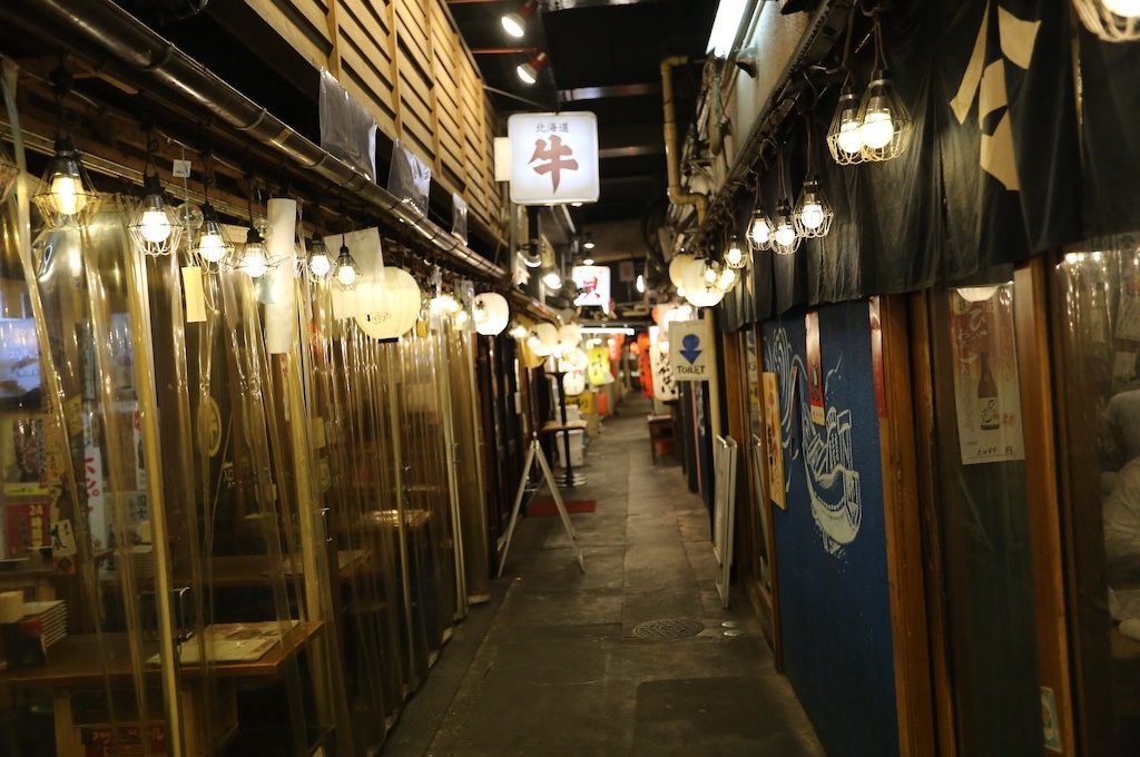 Restaurant lined alleyway Tokyo