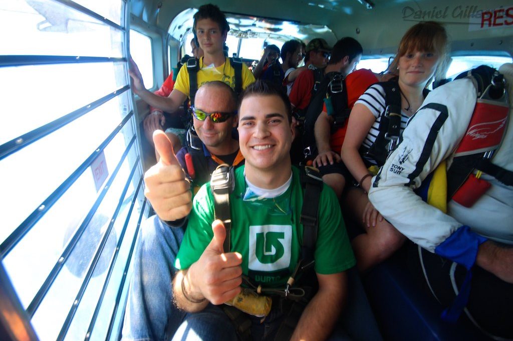 Skydivers in plane waiting to jump