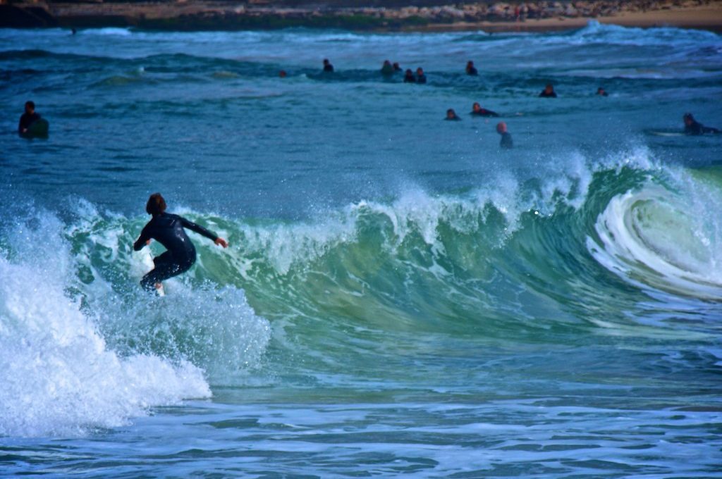 Surfer riding wave Bondi Beach Australia
