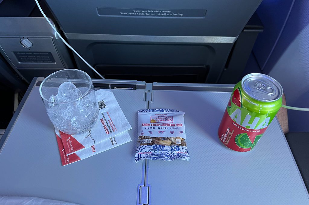 American Airlines A321 First Class Hawaii snack and water