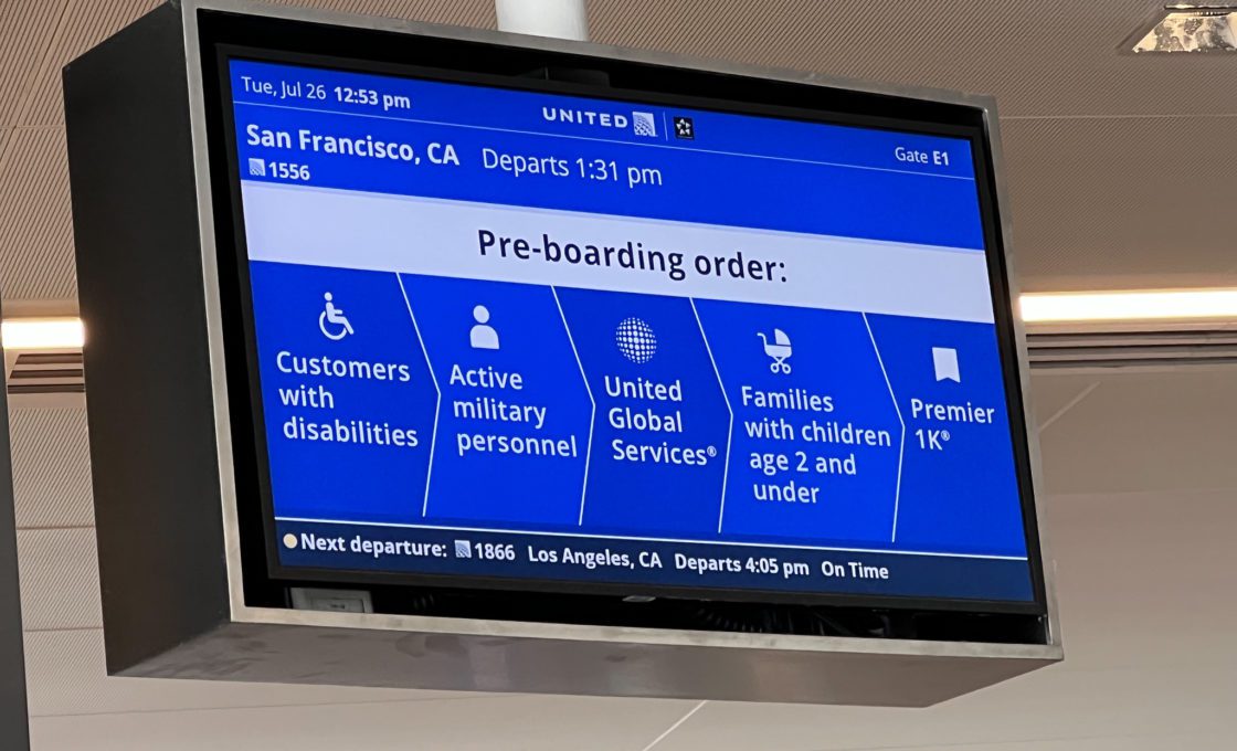 United Airlines preboarding sign