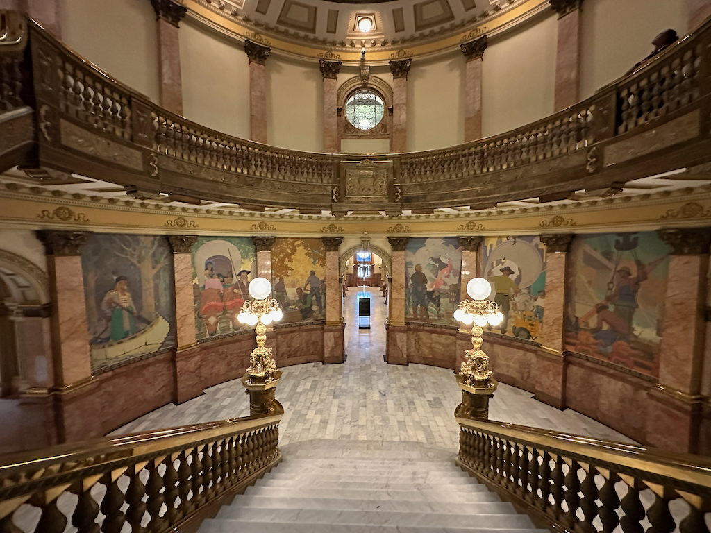 Colorado State Capitol grand staircase looking down at murals