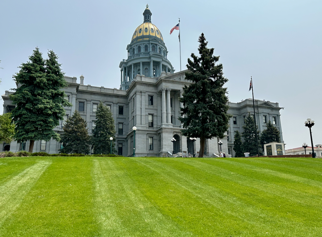 Colorado State Capitol front lawn with view of gold dome