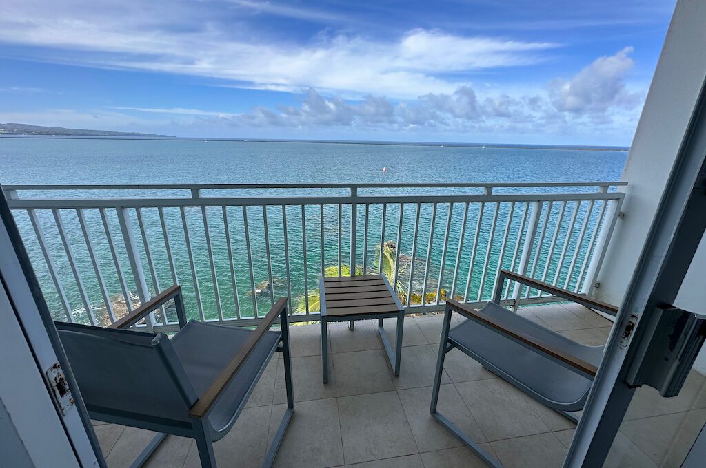 Oceanfront junior suite balcony overlooking ocean at Hilton DoubleTree Hilo