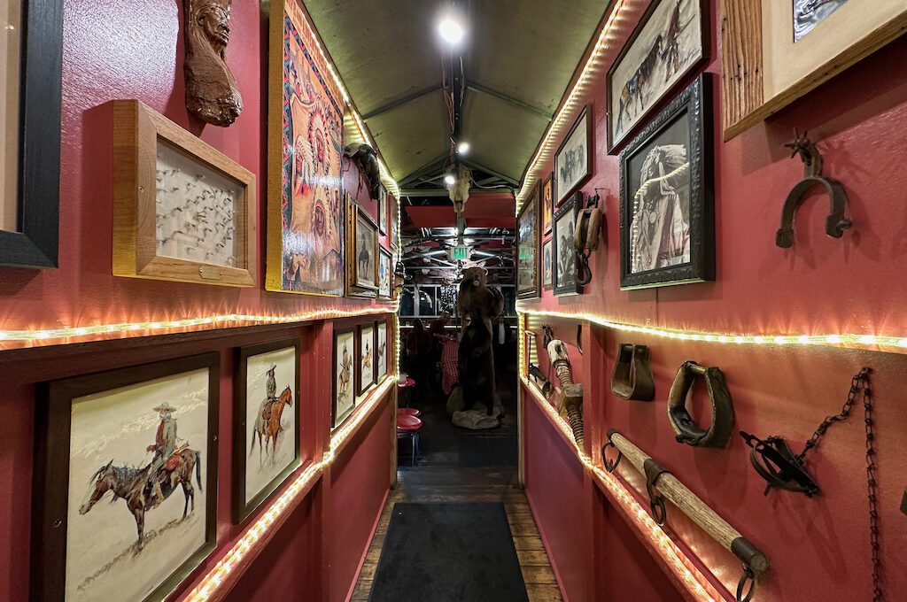 A hallway with pictures on the wall