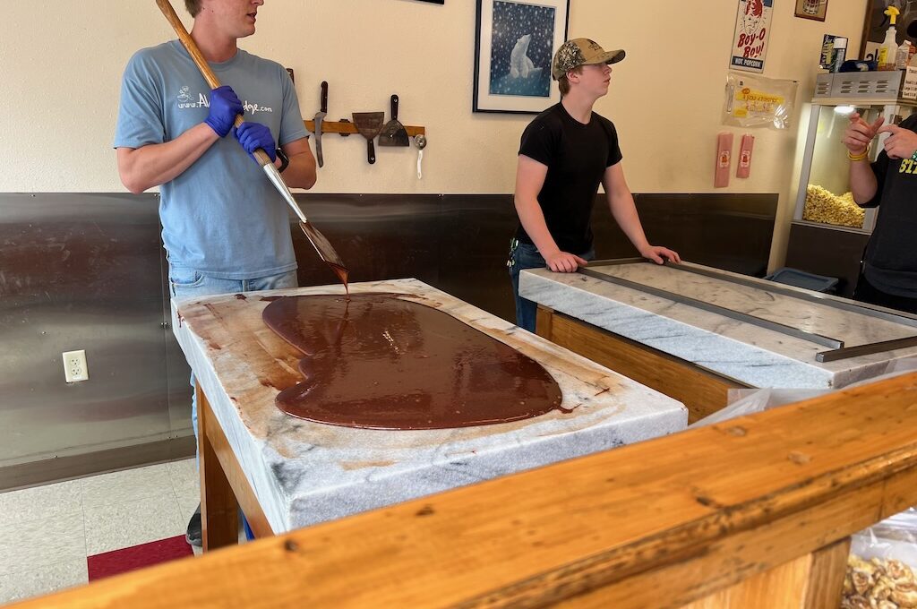 Men making fudge on marble slab Alaskan Fudge Co Juneau