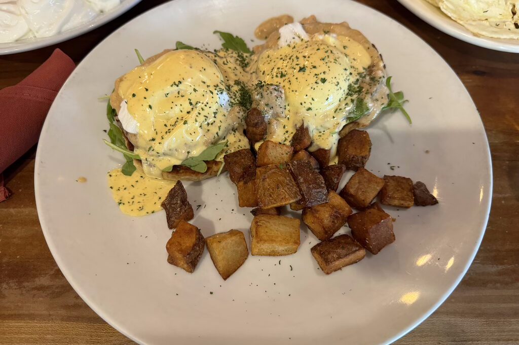 Eggs Benedict with home fries Liz's Cafe, Anybody's Bar