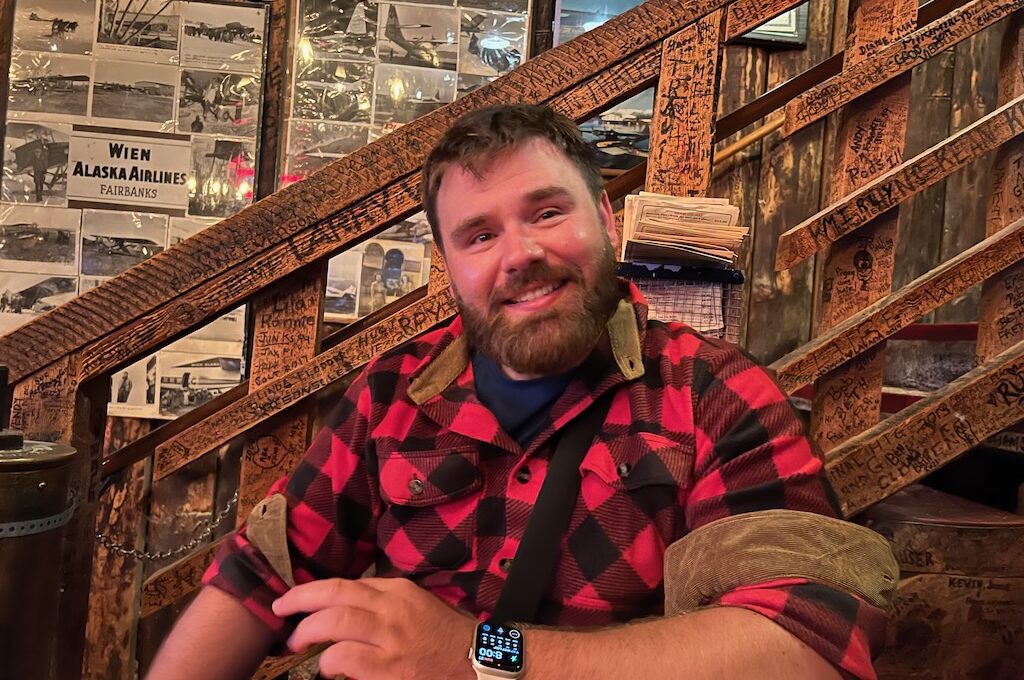Bearded man smiling Red Dog Saloon Juneau